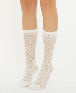 Paire de chaussettes hautes en maille ajourée