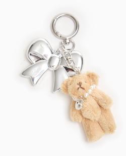 Porte-clé avec mini-peluche et nœud métal