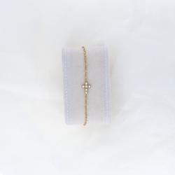 Bracelet doré croix blanche