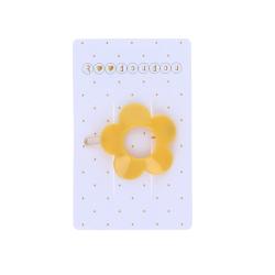 Barrette fleur jaune