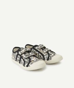 Les baskets blanches et noires fleuries aux bandes auto-agrippantes - 35