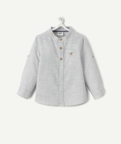 La chemise rayée bleue et blanche en coton - 12 M